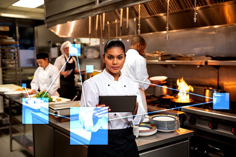 Chef managing kitchen staff, menu and food costs with TVI directly integrated with inventory, CRM and accounting. 