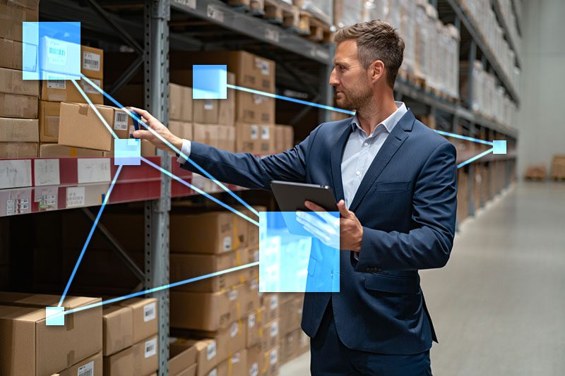Business owner conducting inventory control with TVI, featuring smart inventory management and reordering for when stock is low. 