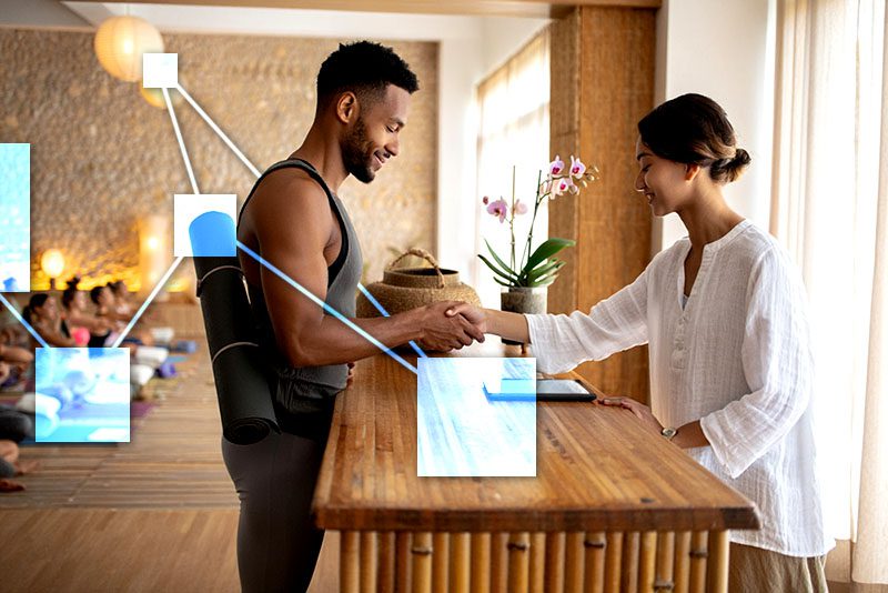 Yoda studio owner applying promotional discount at checkout using TVI POS and CRM connected to accounting. 