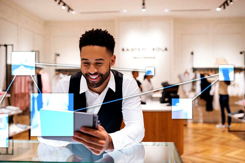 Retail shop owner utilizing TVI business management software - integrated POS, CRM, accounting and inventory. 