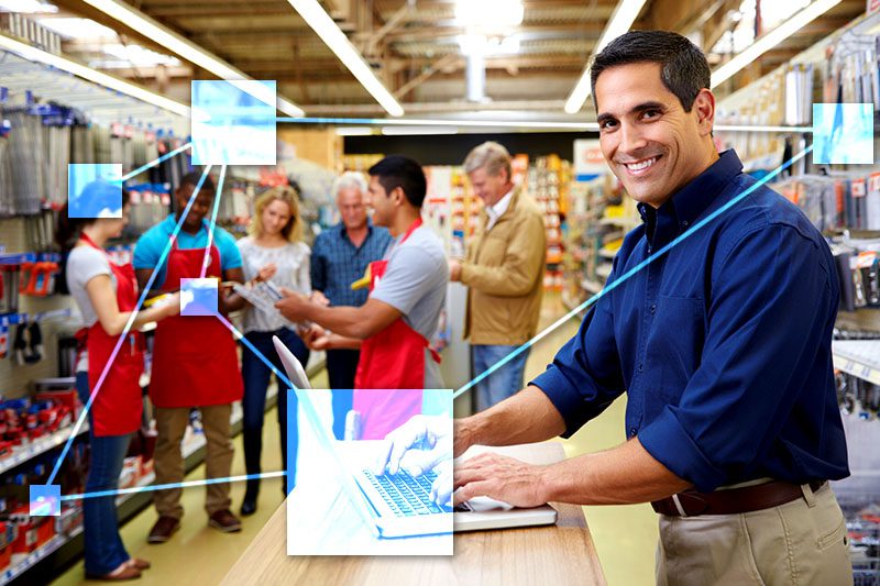 SMB owner with TVI on laptop doing inventory control, leveraging automatic smart reordering when stock gets low.