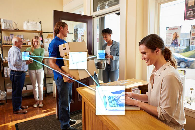 Small business owner managing inventory with TVI smart stock reordering - integrated with accounting.