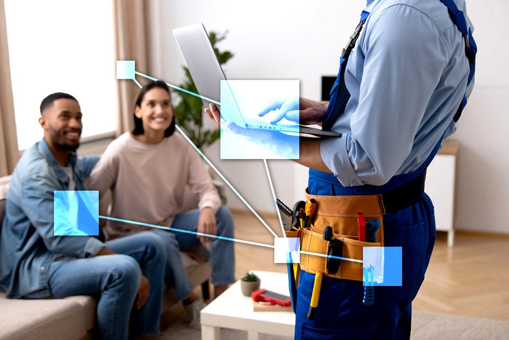 Trades handyman with laptop using TVI software for job and service estimates, automatically turning them to invoices and purchase orders. 